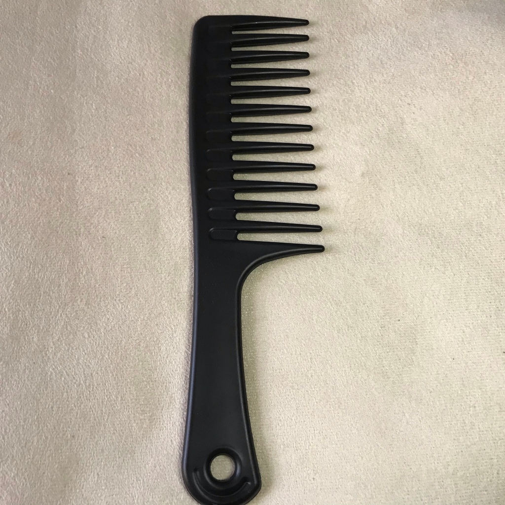 Black wide tooth comb